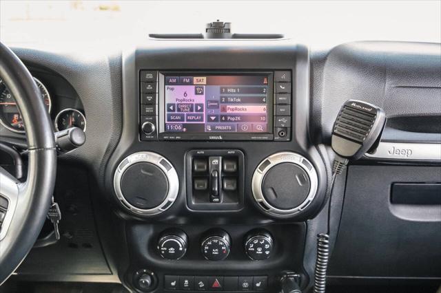 used 2014 Jeep Wrangler Unlimited car, priced at $24,997