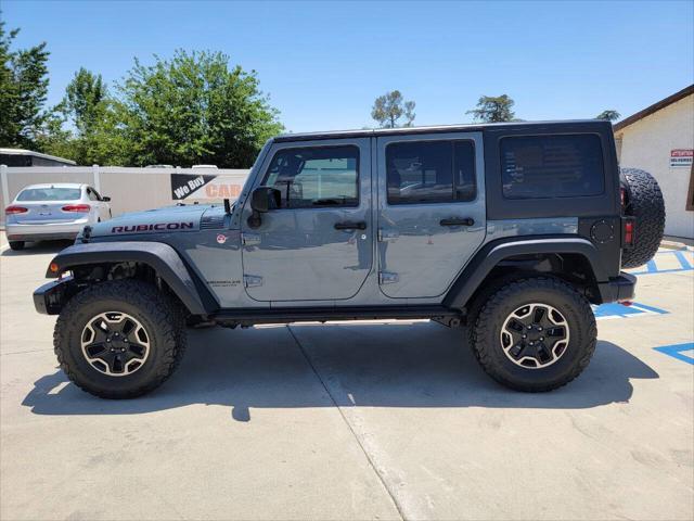 used 2014 Jeep Wrangler Unlimited car, priced at $24,997