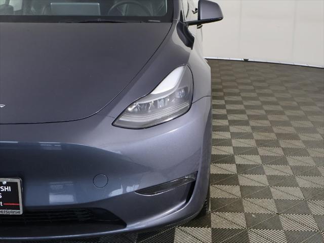 used 2023 Tesla Model Y car, priced at $30,099