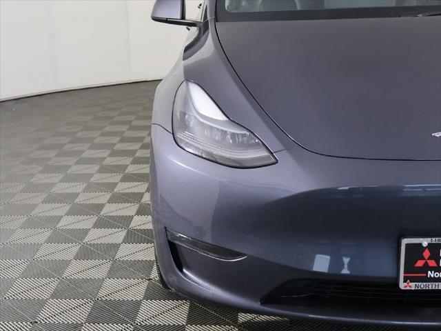 used 2023 Tesla Model Y car, priced at $30,099