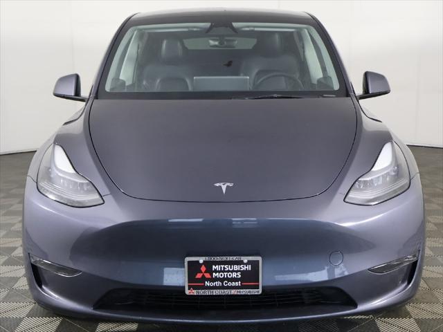 used 2023 Tesla Model Y car, priced at $30,099