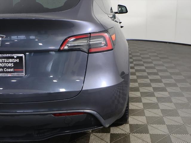 used 2023 Tesla Model Y car, priced at $30,099