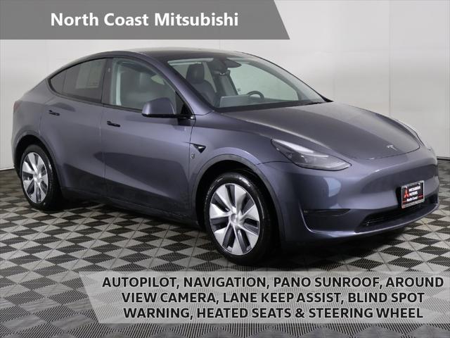 used 2023 Tesla Model Y car, priced at $30,099