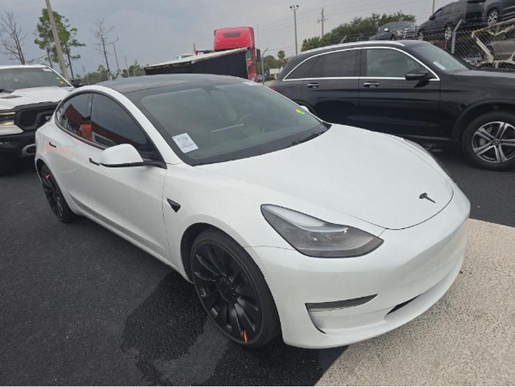 used 2023 Tesla Model 3 car, priced at $27,699