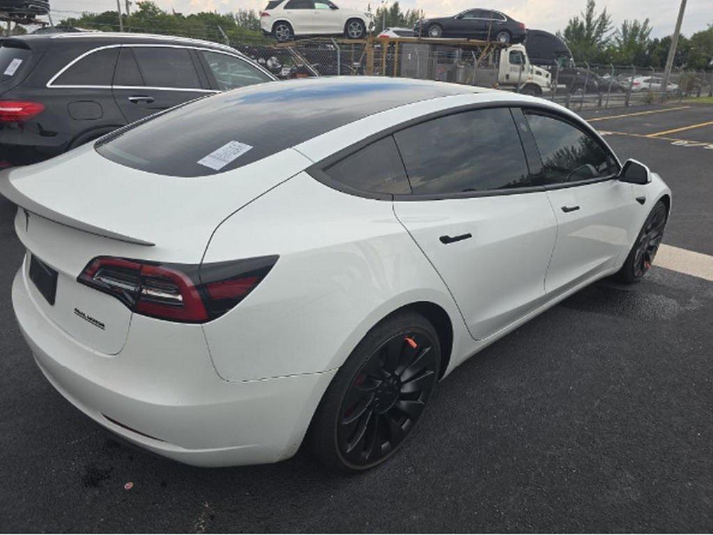 used 2023 Tesla Model 3 car, priced at $27,699