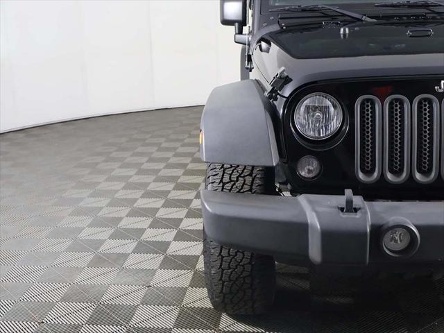 used 2015 Jeep Wrangler Unlimited car, priced at $15,859