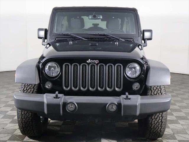 used 2015 Jeep Wrangler Unlimited car, priced at $15,859