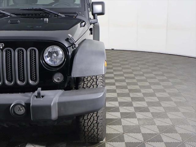 used 2015 Jeep Wrangler Unlimited car, priced at $15,859