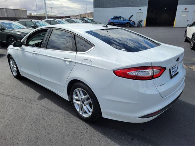used 2016 Ford Fusion car, priced at $14,090