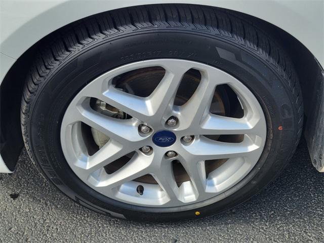 used 2016 Ford Fusion car, priced at $14,090