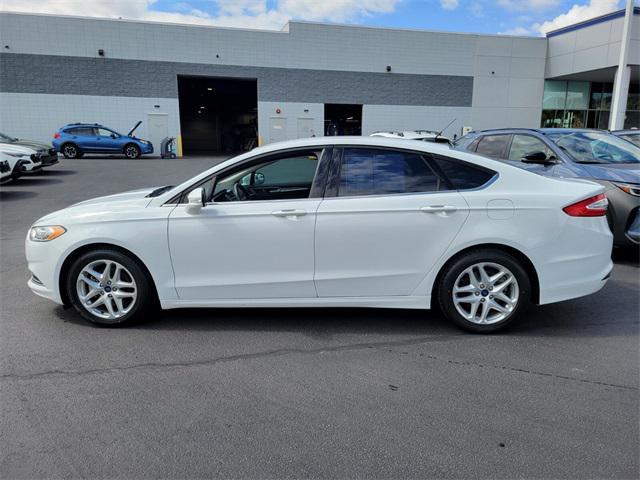 used 2016 Ford Fusion car, priced at $14,090