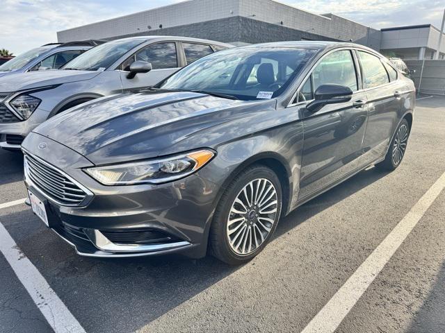 used 2018 Ford Fusion car, priced at $13,990