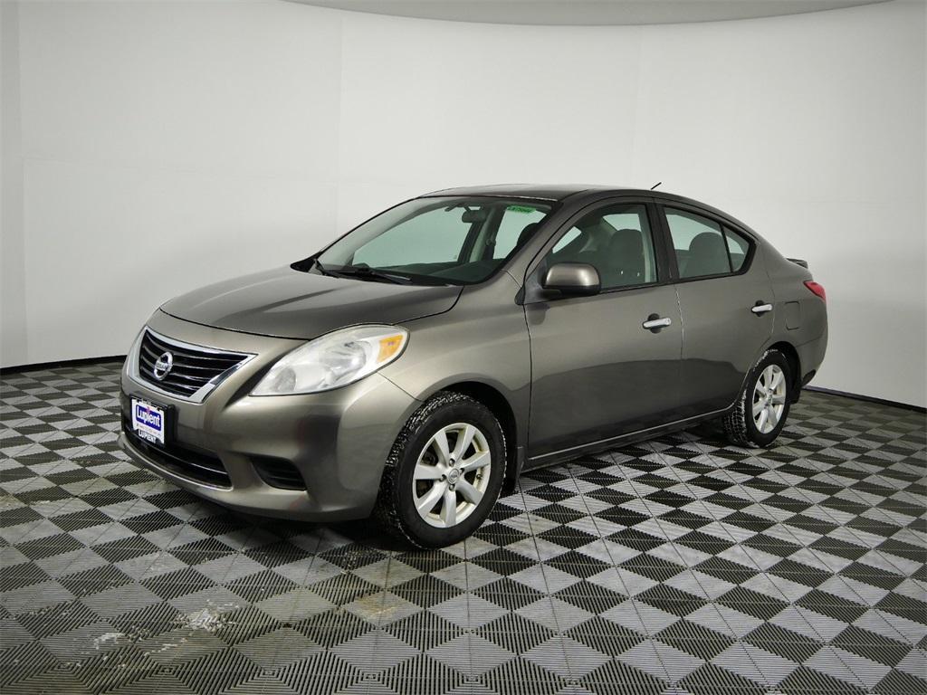 used 2014 Nissan Versa car, priced at $7,900