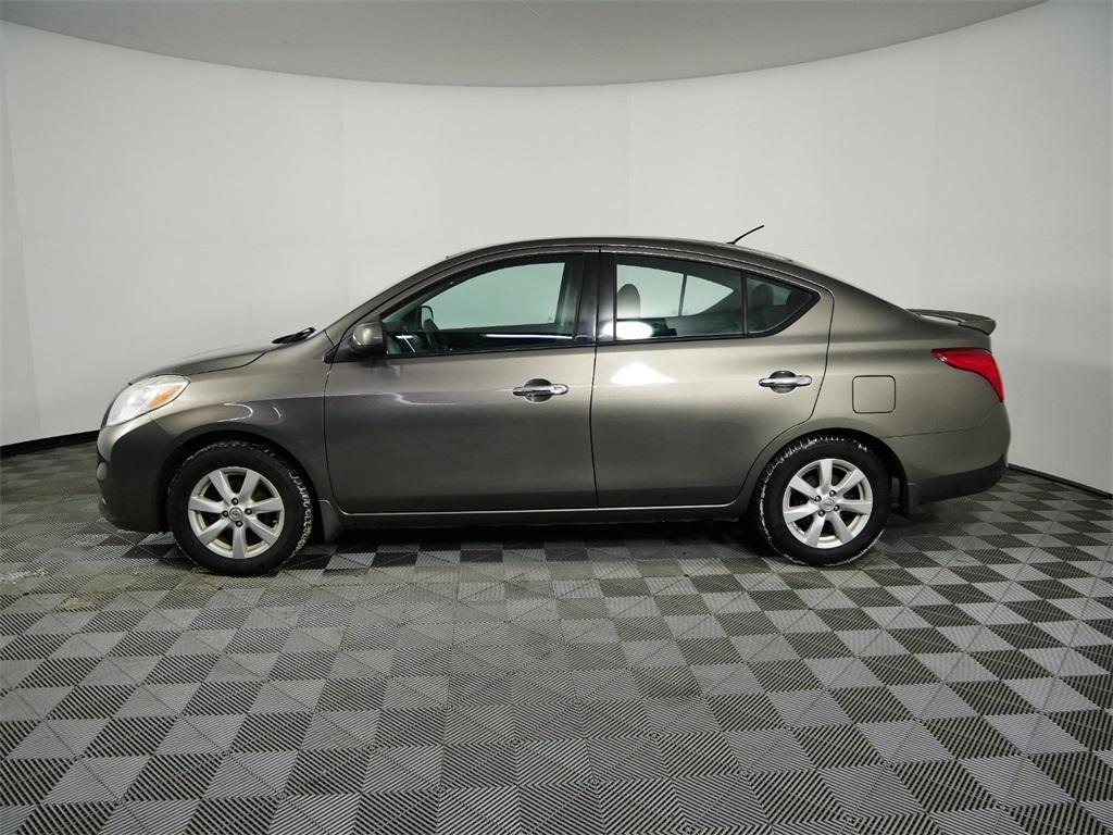 used 2014 Nissan Versa car, priced at $7,900