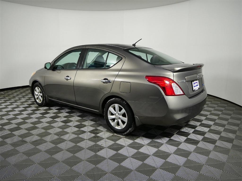 used 2014 Nissan Versa car, priced at $7,900