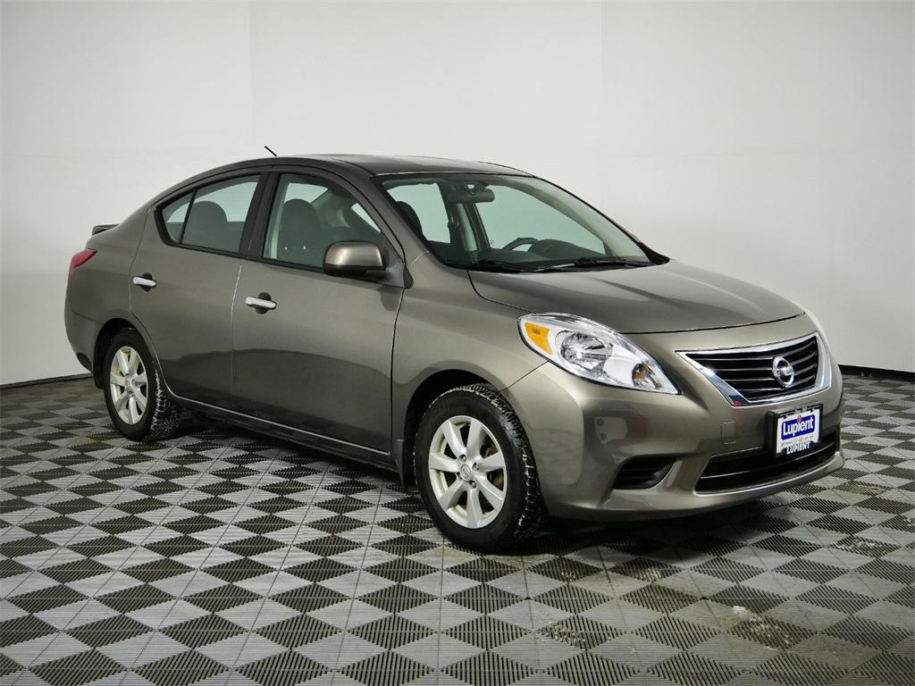 used 2014 Nissan Versa car, priced at $7,900