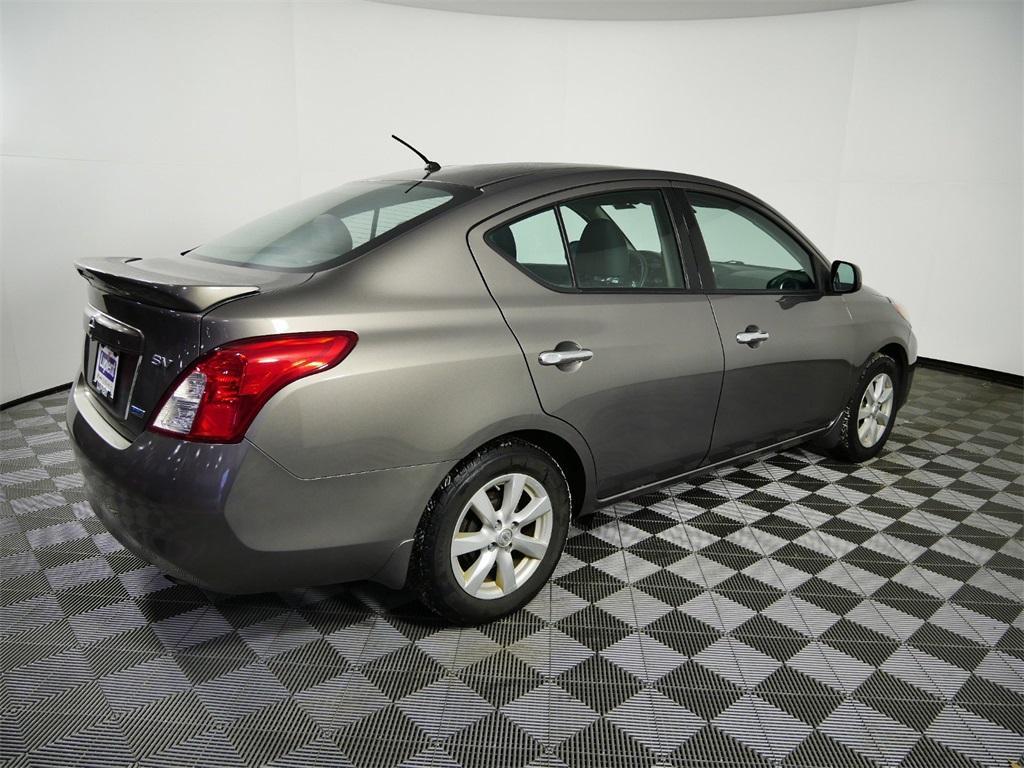 used 2014 Nissan Versa car, priced at $7,900