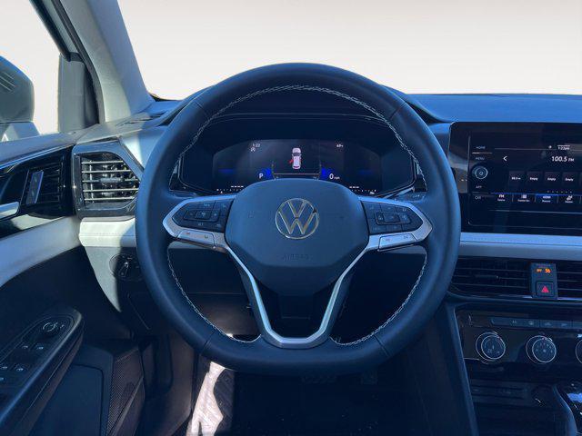 new 2025 Volkswagen Taos car, priced at $27,083