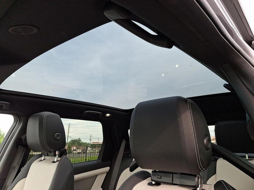 used 2025 Land Rover Discovery Sport car, priced at $43,750