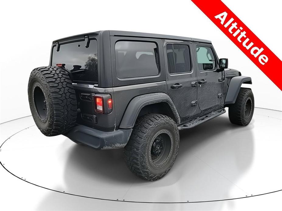 used 2021 Jeep Wrangler Unlimited car, priced at $29,977