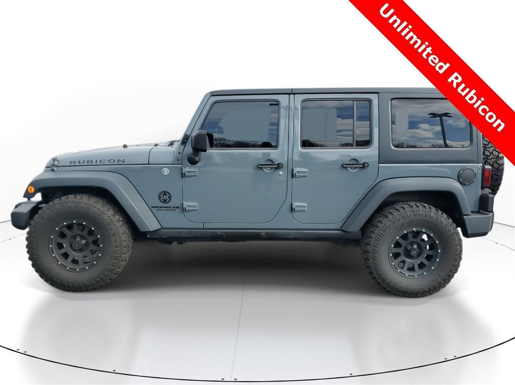 used 2014 Jeep Wrangler Unlimited car, priced at $16,977