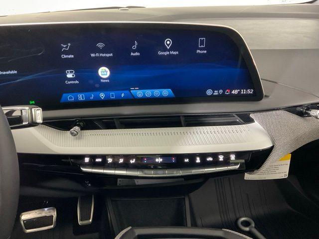 new 2026 Cadillac OPTIQ car, priced at $59,695
