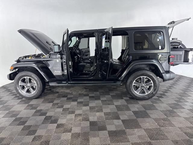 used 2023 Jeep Wrangler car, priced at $34,000