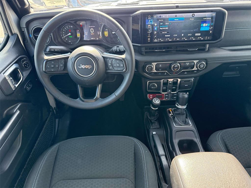 used 2024 Jeep Wrangler 4xe car, priced at $36,995