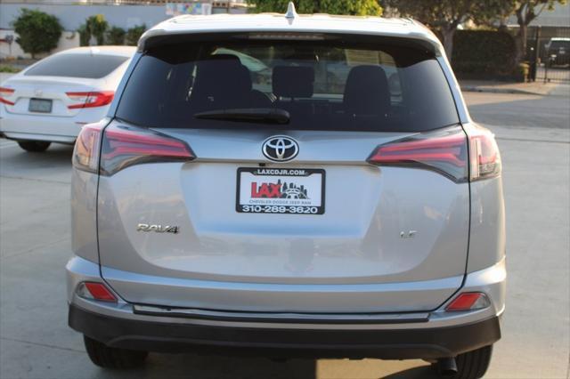 used 2018 Toyota RAV4 car, priced at $18,000