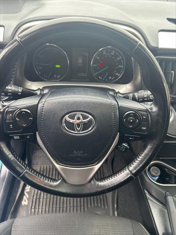 used 2018 Toyota RAV4 Hybrid car, priced at $16,990