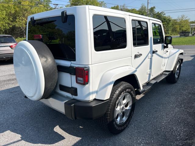 used 2015 Jeep Wrangler Unlimited car, priced at $21,490