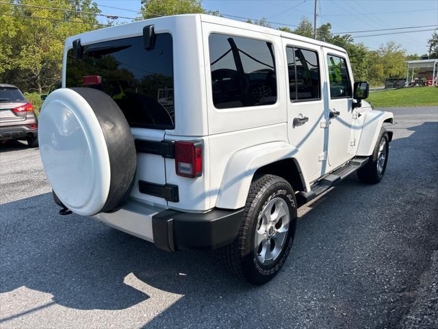 used 2015 Jeep Wrangler Unlimited car, priced at $21,490