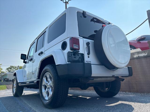 used 2015 Jeep Wrangler Unlimited car, priced at $21,490