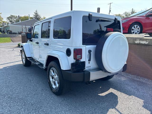 used 2015 Jeep Wrangler Unlimited car, priced at $21,490