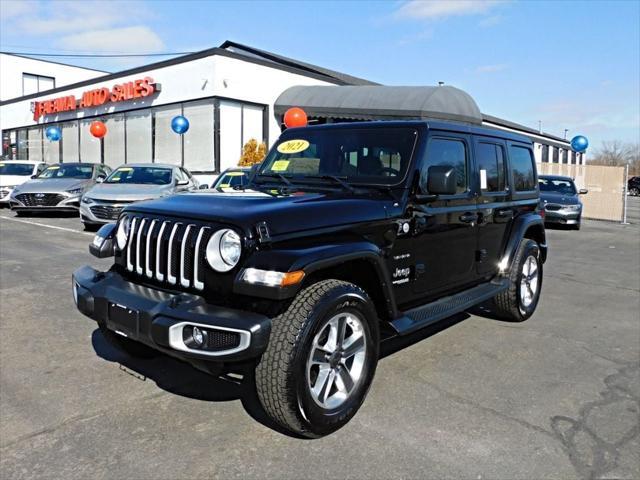 used 2021 Jeep Wrangler Unlimited car, priced at $30,590