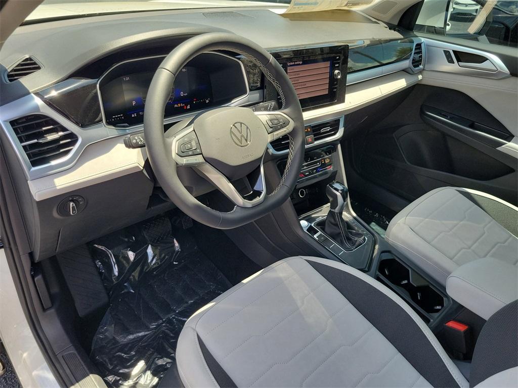 new 2025 Volkswagen Taos car, priced at $28,028