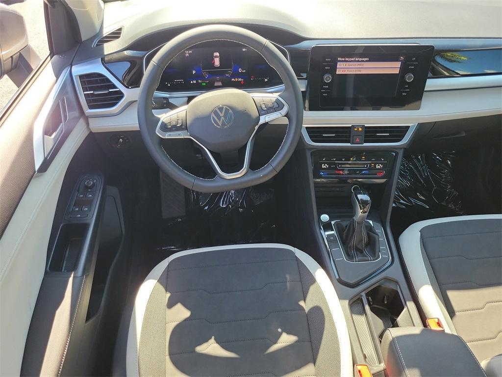 new 2025 Volkswagen Taos car, priced at $27,012