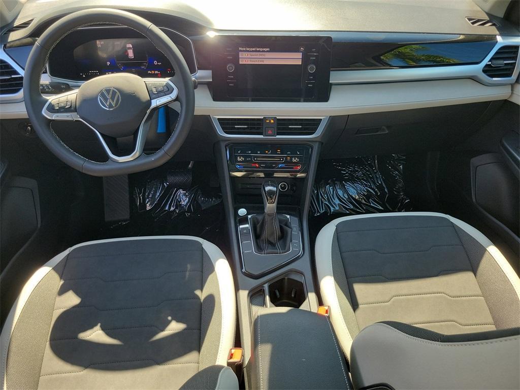 new 2025 Volkswagen Taos car, priced at $27,012