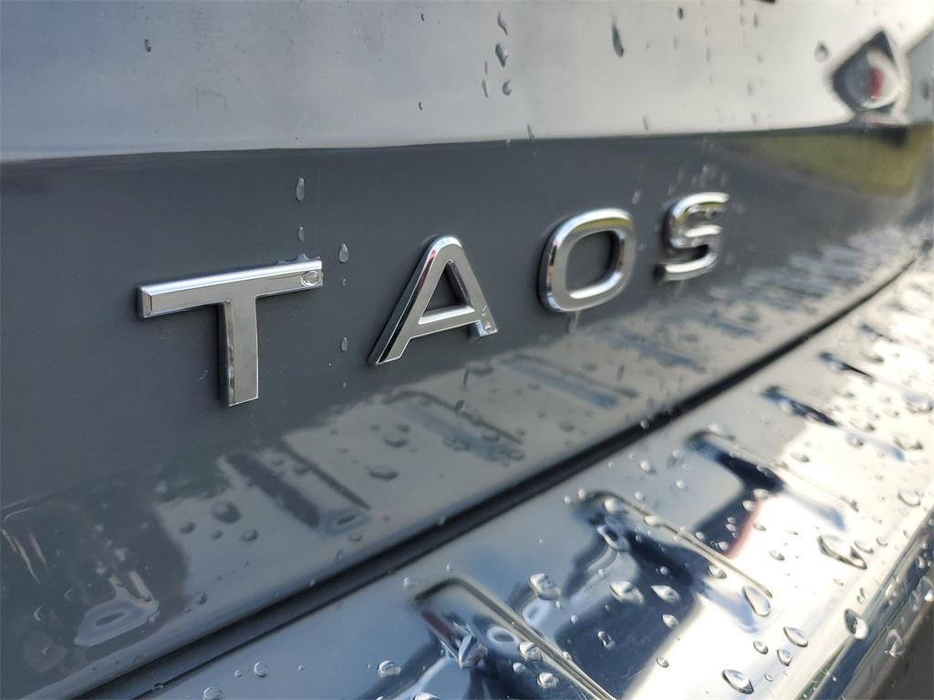 used 2023 Volkswagen Taos car, priced at $19,744