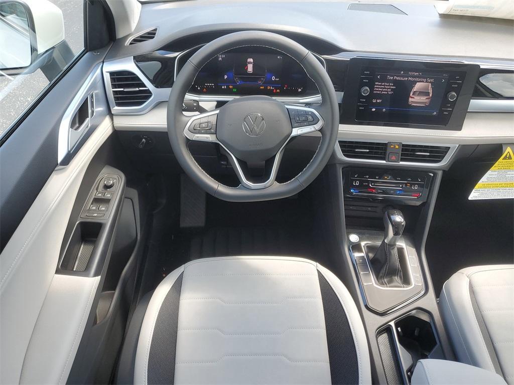 new 2025 Volkswagen Taos car, priced at $28,263