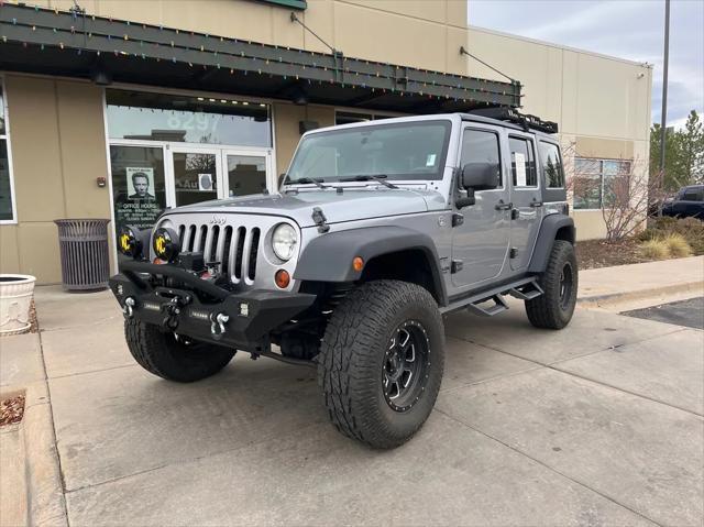 used 2013 Jeep Wrangler Unlimited car, priced at $20,989