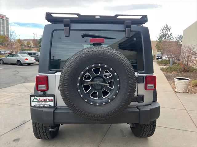 used 2013 Jeep Wrangler Unlimited car, priced at $20,989