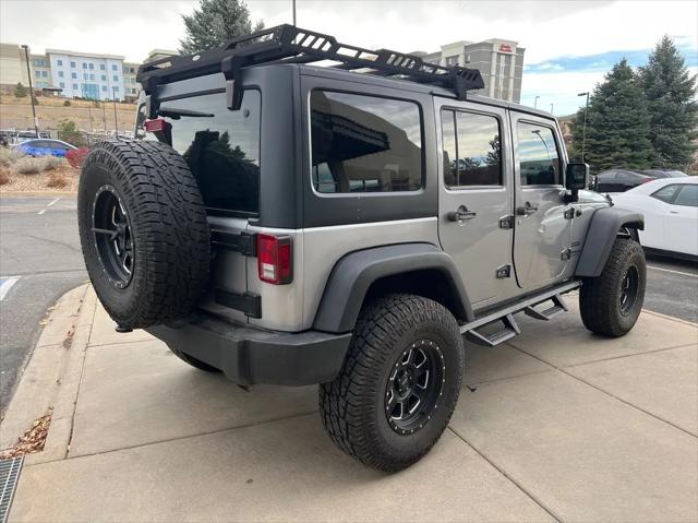 used 2013 Jeep Wrangler Unlimited car, priced at $20,989