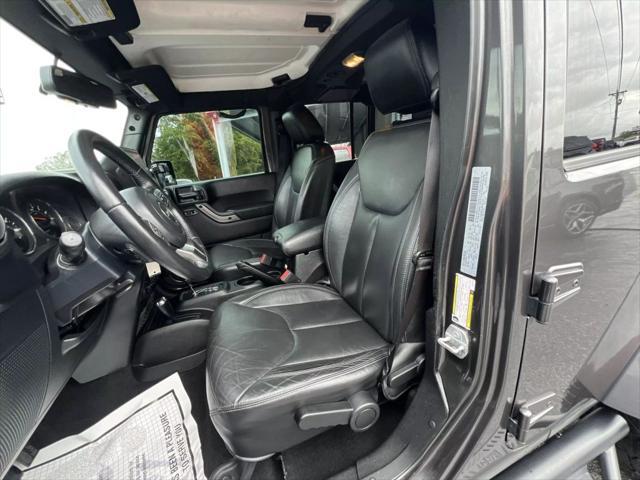 used 2018 Jeep Wrangler JK Unlimited car, priced at $23,980