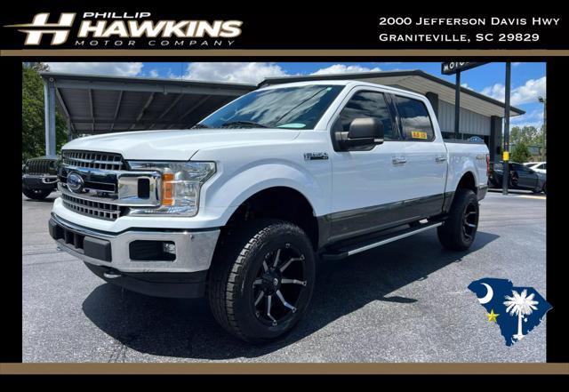 used 2018 Ford F-150 car, priced at $25,980