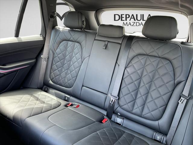 used 2024 BMW X5 PHEV car, priced at $61,900