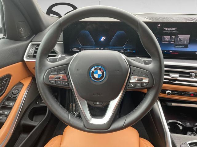 used 2023 BMW 330e car, priced at $39,000