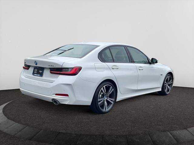 used 2023 BMW 330e car, priced at $39,000
