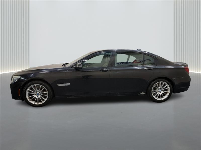 used 2013 BMW 750 car, priced at $12,900