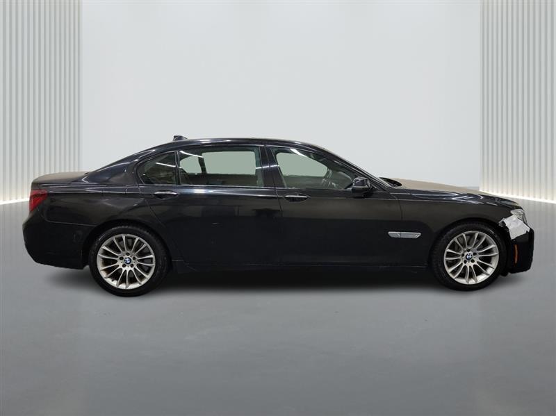 used 2013 BMW 750 car, priced at $12,900